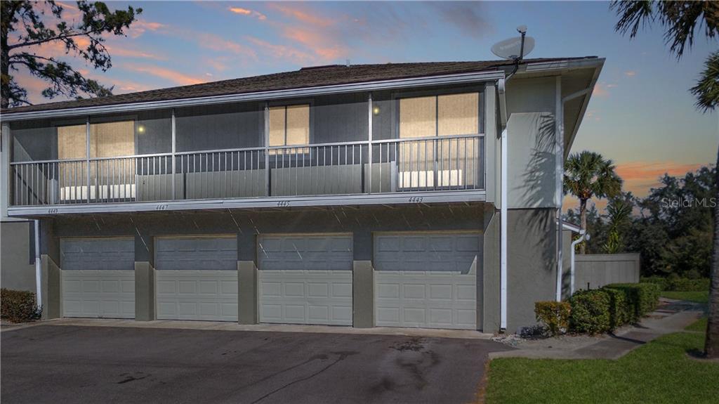 4443 Ring Neck Road, Unit 4443 Orlando, FL 32808 - Photo 1 of 1 Curb Appeal at Sunset! Your Garage is the one on the Right!
