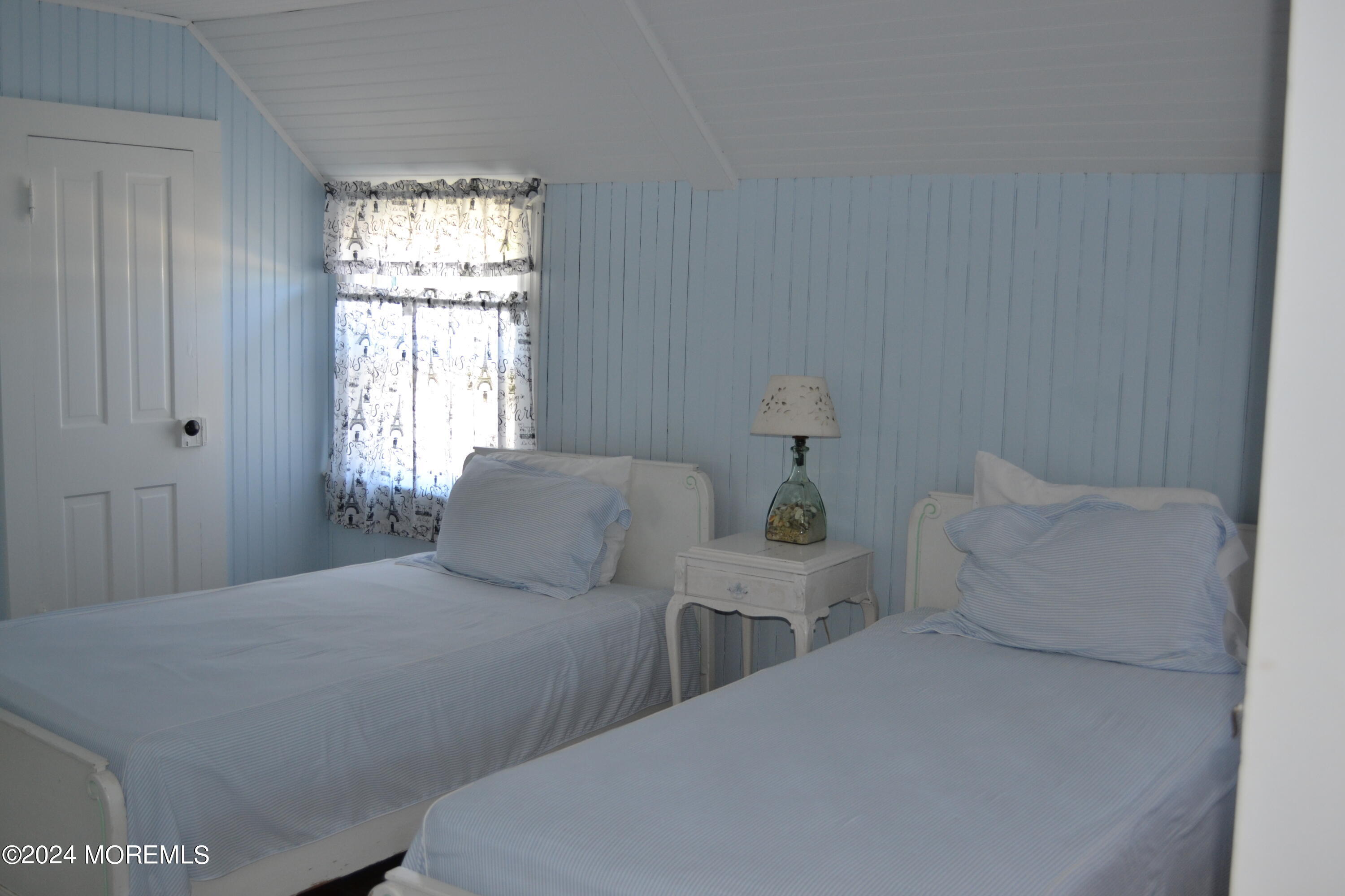 18 Bridge Avenue Bay Head, NJ 08742 - Photo 13 of 20 a bedroom with two beds and a window
