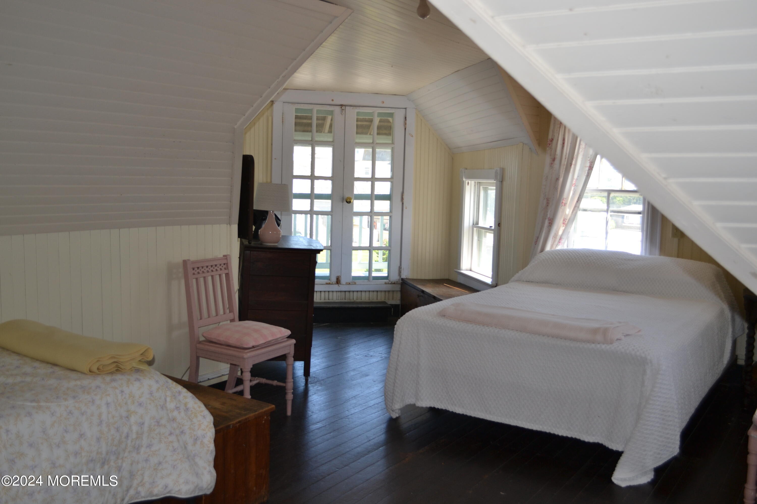 18 Bridge Avenue Bay Head, NJ 08742 - Photo 14 of 20 a bedroom with a bed chair and a window