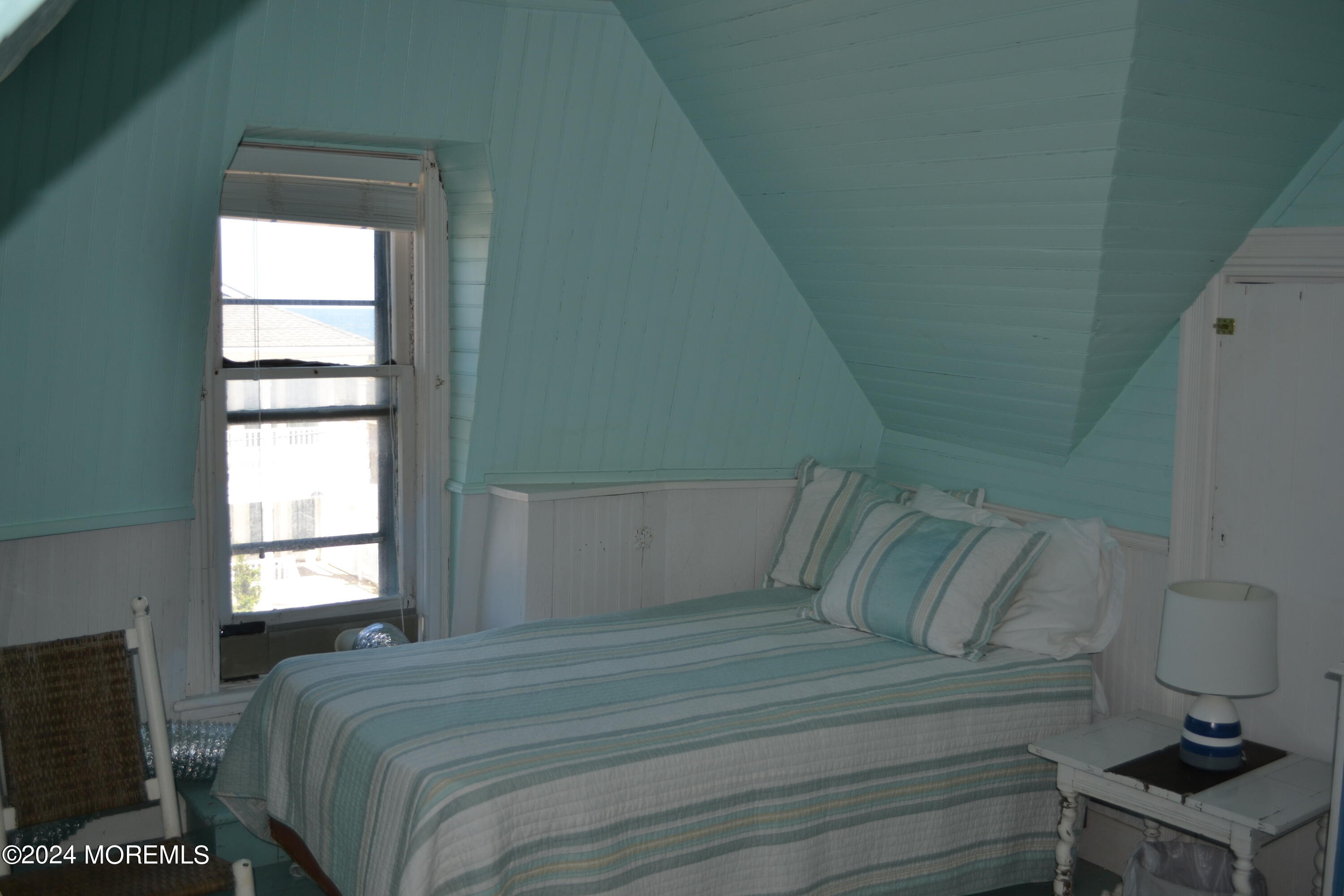 18 Bridge Avenue Bay Head, NJ 08742 - Photo 16 of 20 a bedroom with a bed and window