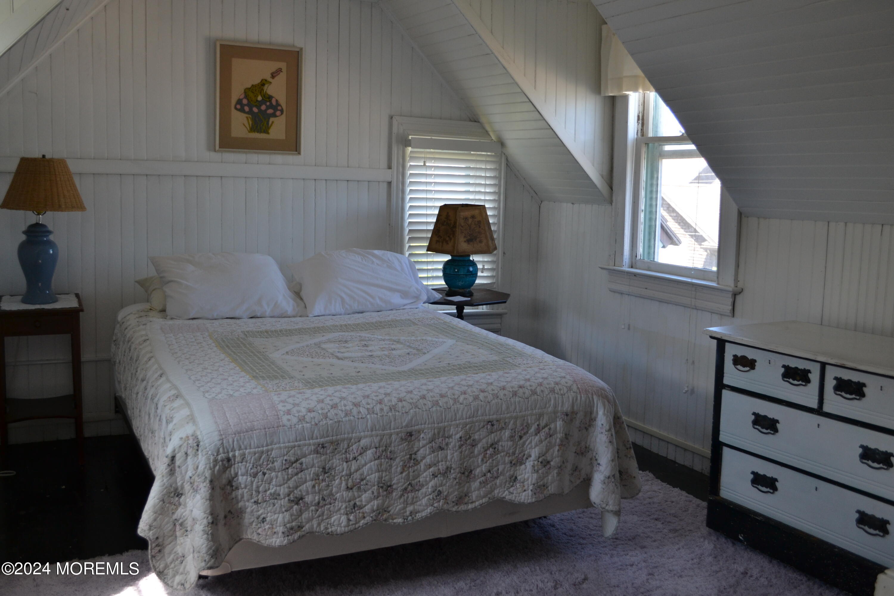 18 Bridge Avenue Bay Head, NJ 08742 - Photo 17 of 20 a bedroom with a bed and a window