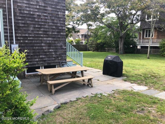 18 Bridge Avenue Bay Head, NJ 08742 - Photo 20 of 20 a backyard of a house with outdoor seating