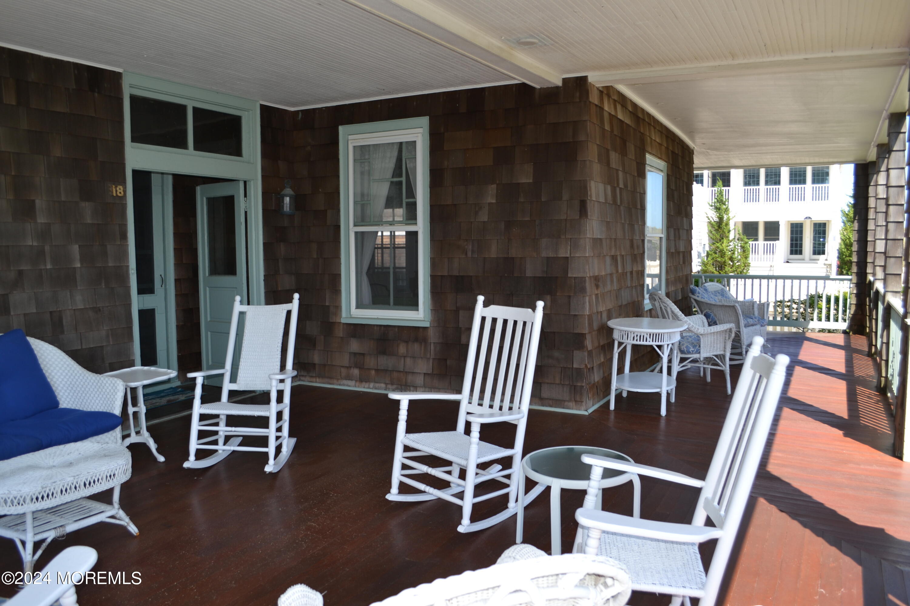 18 Bridge Avenue Bay Head, NJ 08742 - Photo 3 of 20 a view of a dining room with furniture window and wooden floor