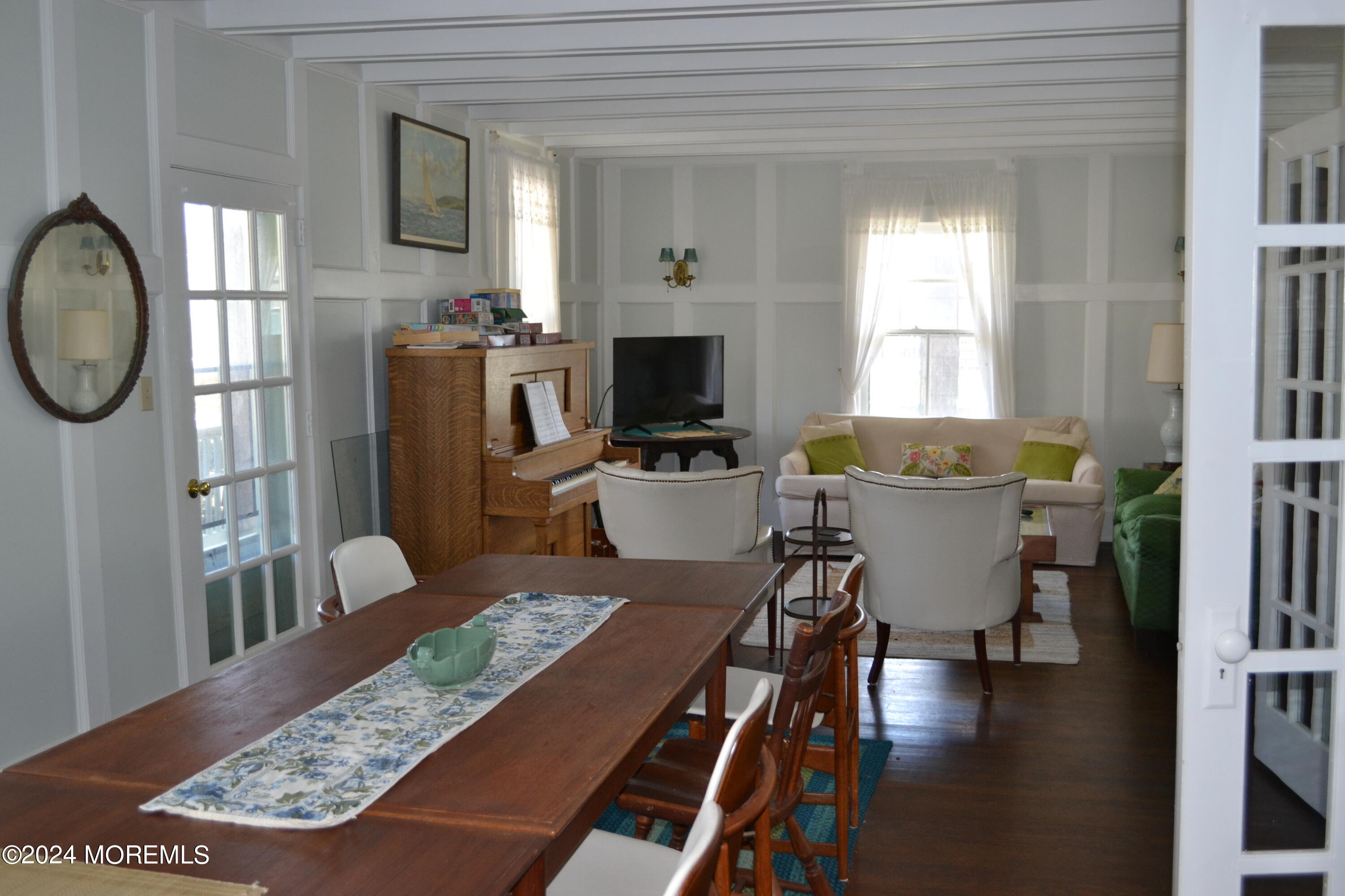 18 Bridge Avenue Bay Head, NJ 08742 - Photo 5 of 20 a view of a dining room with furniture a rug and wooden floor