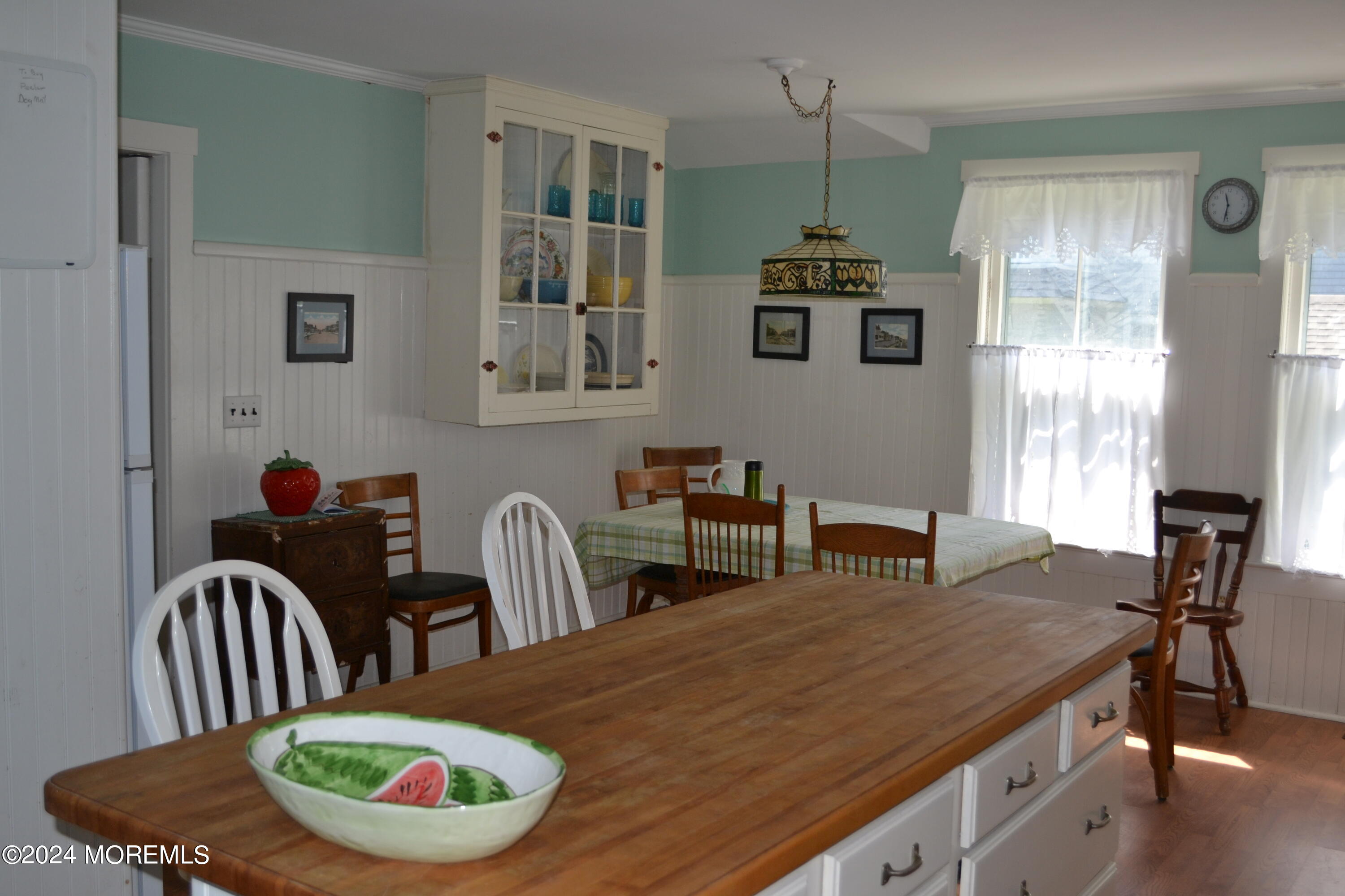 18 Bridge Avenue Bay Head, NJ 08742 - Photo 7 of 20 a table and chairs in a room