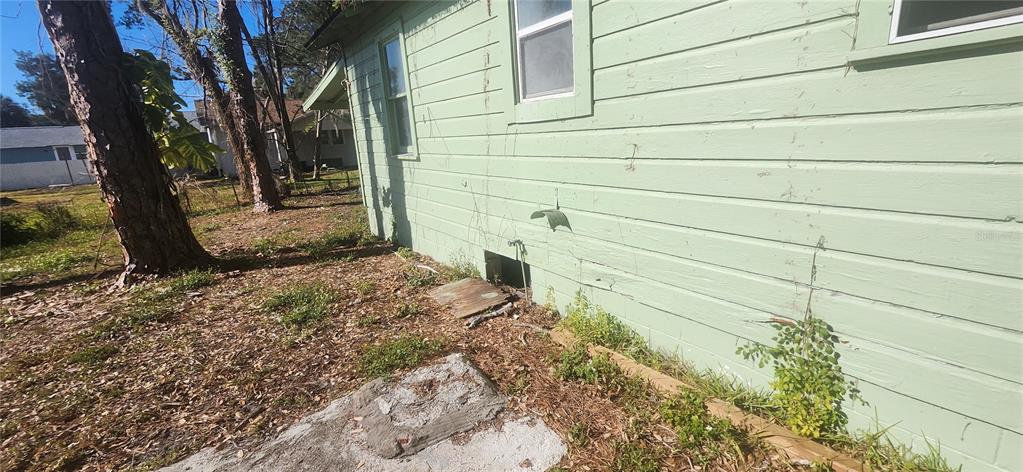 5212 Limestone Drive Port Richey, FL 34668 - Photo 15 of 17 a view of a backyard of the house