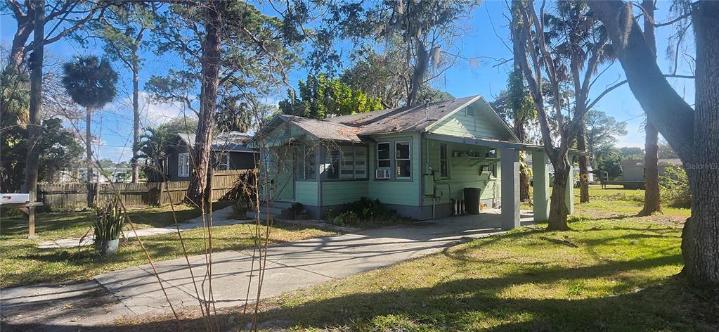 5212 Limestone Drive Port Richey, FL 34668 - Photo 17 of 17 a view of a house with snow on the wall