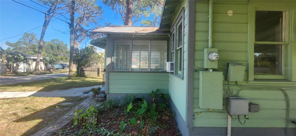 5212 Limestone Drive Port Richey, FL 34668 - Photo 7 of 17 a view of a house with a small yard