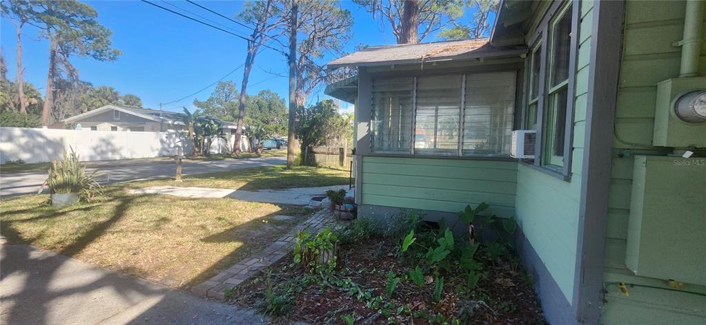 5212 Limestone Drive Port Richey, FL 34668 - Photo 8 of 17 a view of a pathway of house with backyard