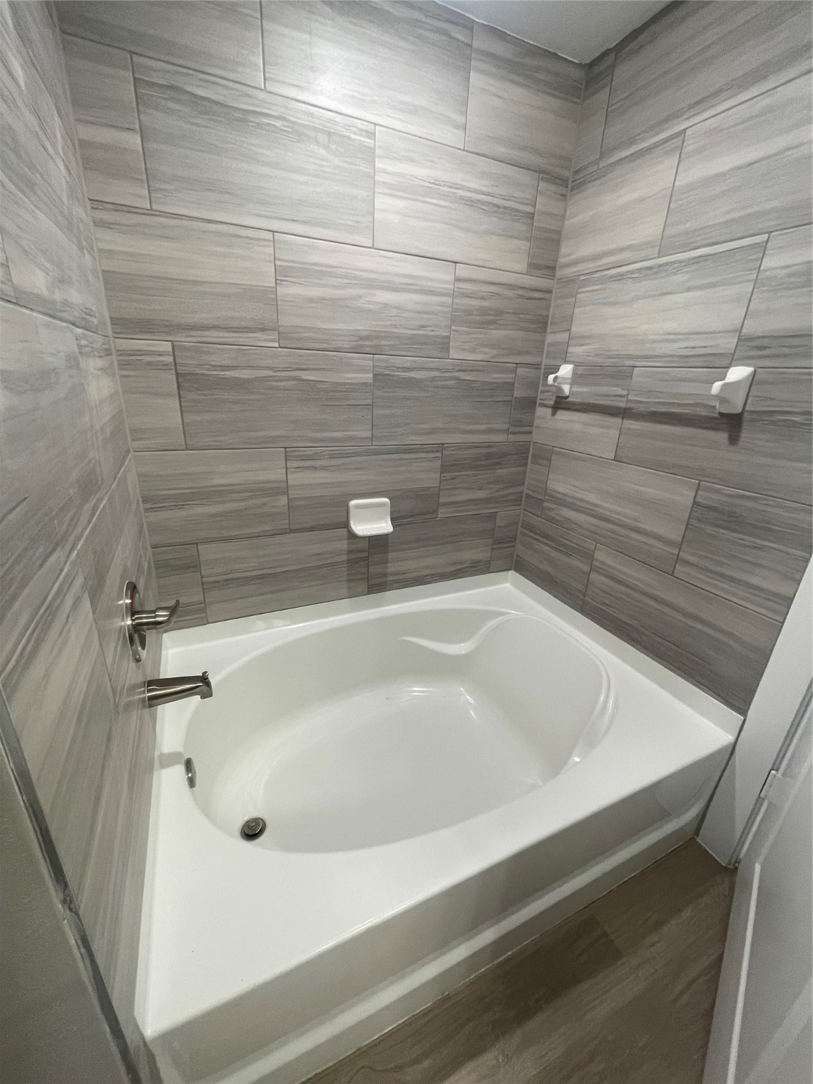 20525 Ella Boulevard, Unit 4109 Spring, TX 77388 - Photo 6 of 7 a bathroom with a bathtub