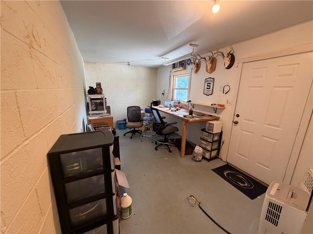 526 East River Road Edinburg, PA 16116 - Photo 35 of 45 a view of a room with gym equipment