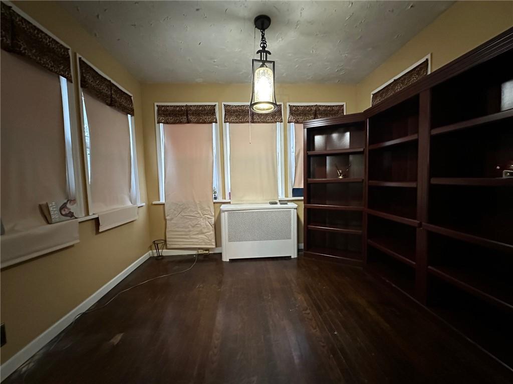 143-20 182nd Place Queens, NY 11413 - Photo 6 of 17 a view of walk in closet with empty racks