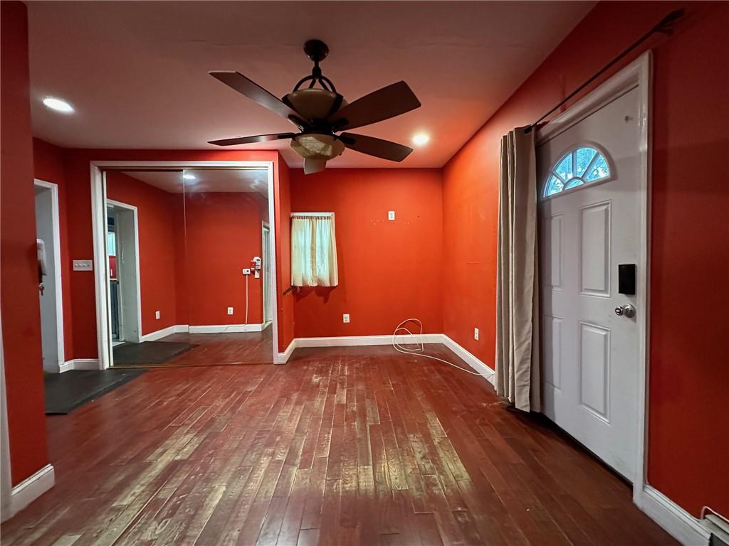 143-20 182nd Place Queens, NY 11413 - Photo 10 of 17 a view of empty room with wooden floor