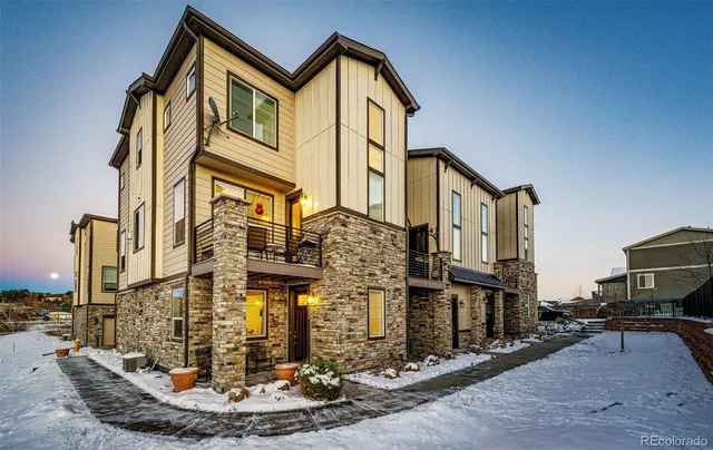a view of a house with a street