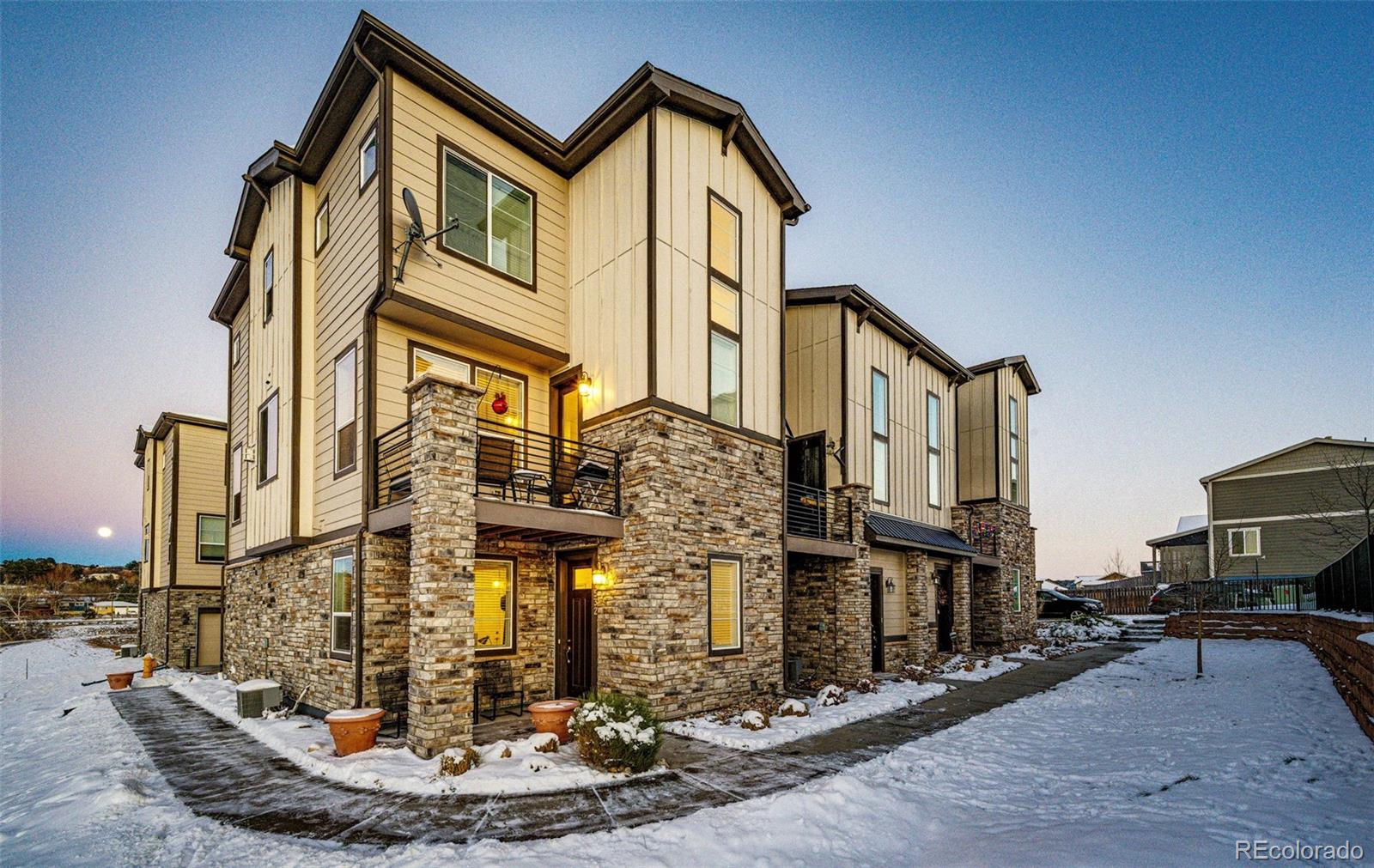 a view of a house with a street