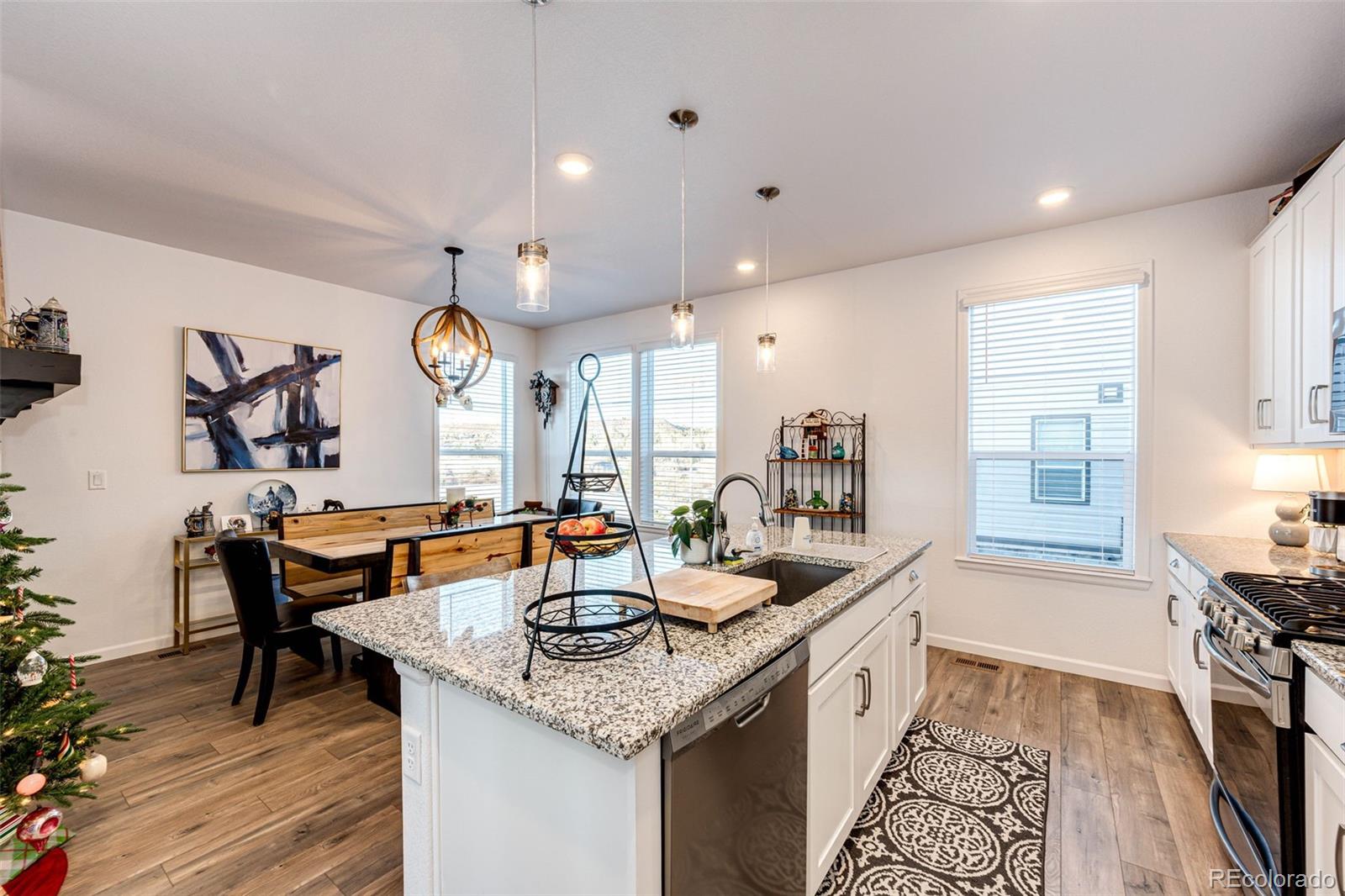 1532 Castle Creek Circle Castle Rock, CO 80104 - Photo 16 of 39 a kitchen with a sink and cabinets