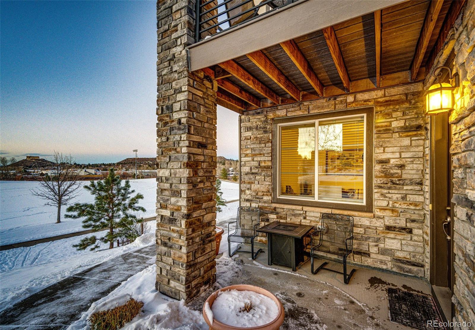 1532 Castle Creek Circle Castle Rock, CO 80104 - Photo 2 of 39 a bathroom with a toilet sink and mirror