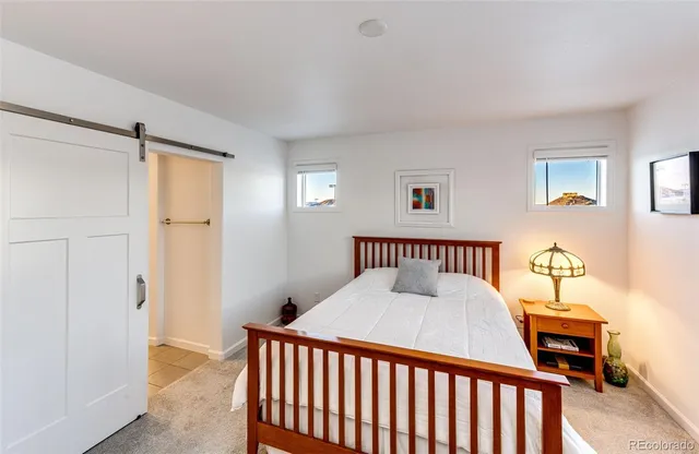 a view of a hallway with a bedroom