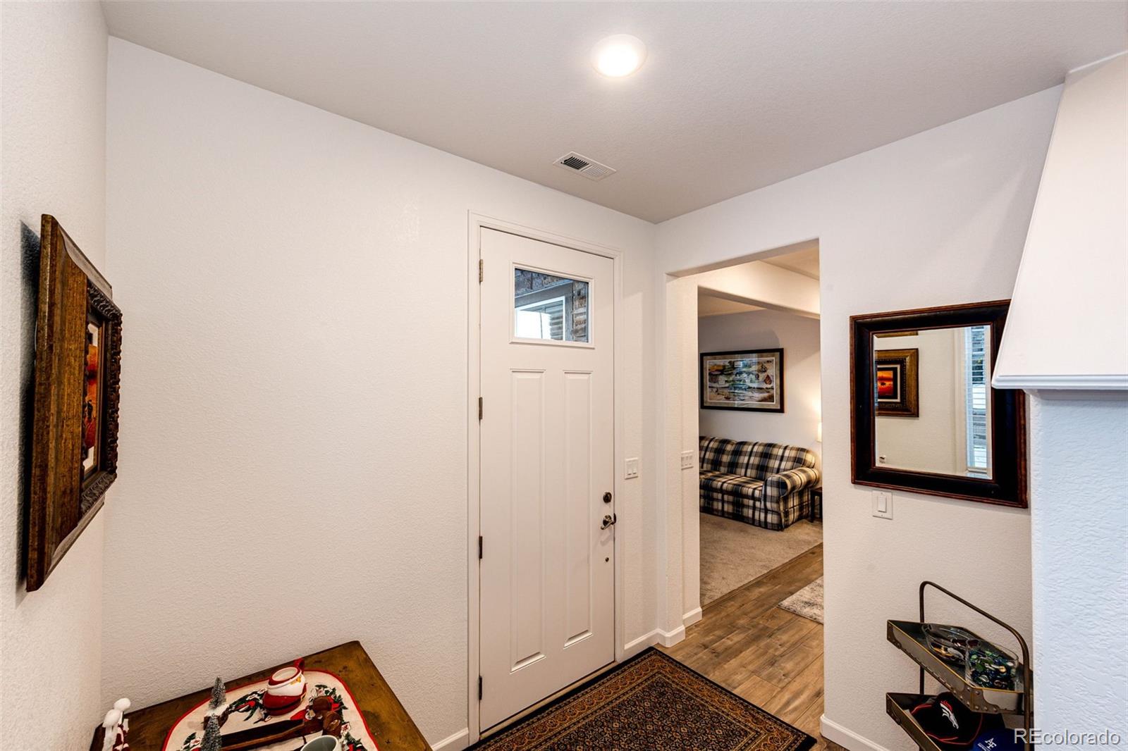 1532 Castle Creek Circle Castle Rock, CO 80104 - Photo 3 of 39 a view of a livingroom with a fireplace