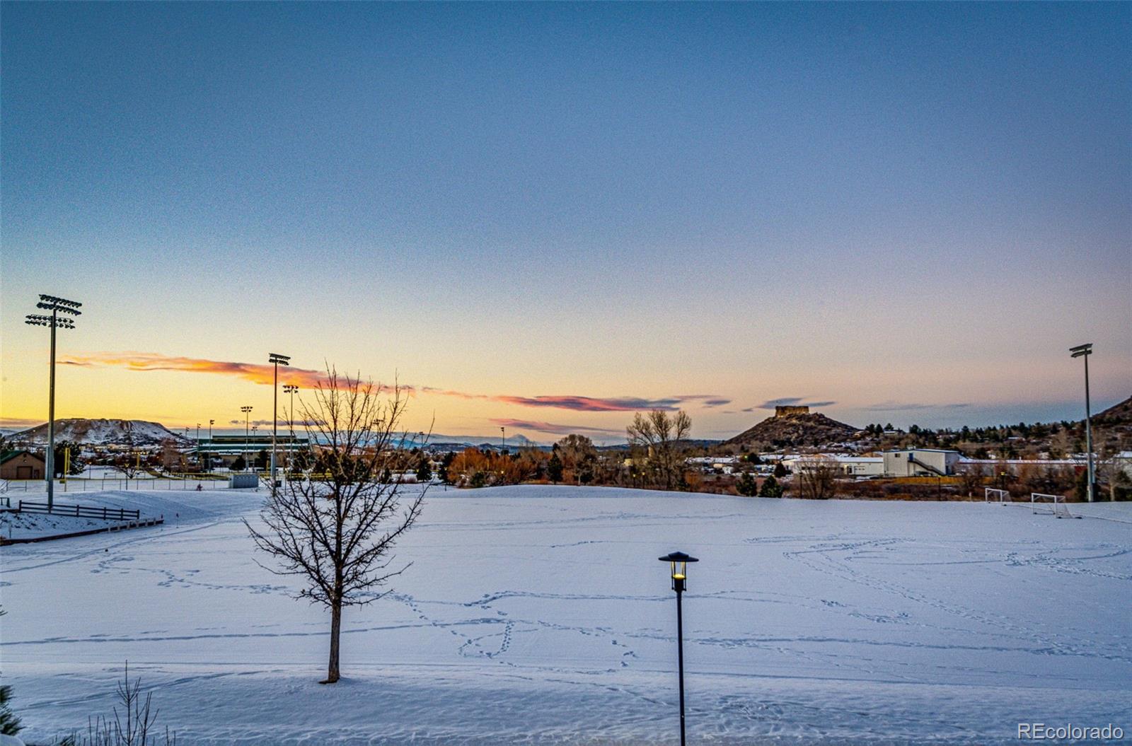 1532 Castle Creek Circle Castle Rock, CO 80104 - Photo 33 of 39 a view of a terrace with a bench