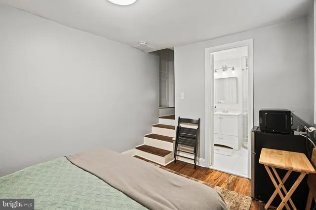 a bedroom with a bed and a closet