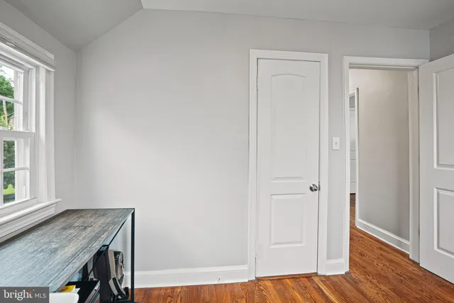 a bathroom with a sink vanity granite toilet tub and shower