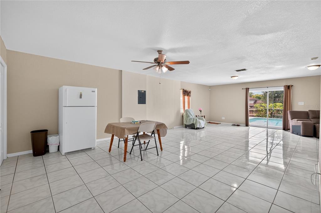 1922 Matthew Court Lakeland, FL 33813 - Photo 27 of 41 a view of a livingroom with furniture and a table chairs