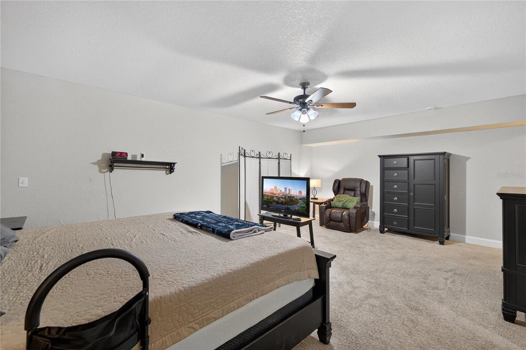 1922 Matthew Court Lakeland, FL 33813 - Photo 29 of 41 a bedroom with furniture and a bed