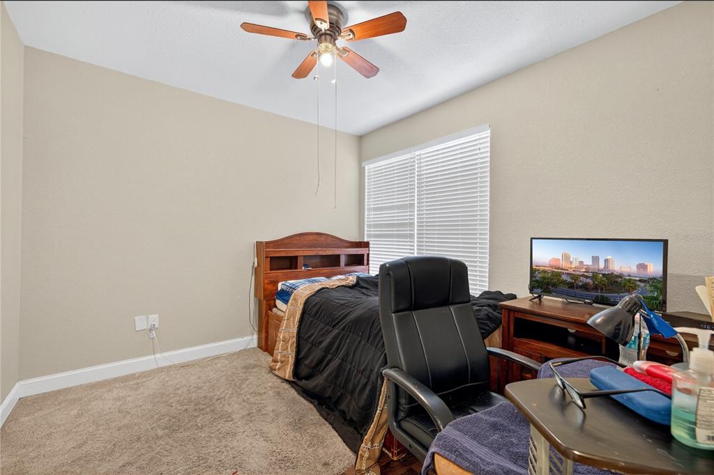 1922 Matthew Court Lakeland, FL 33813 - Photo 31 of 41 a bedroom with furniture and a window