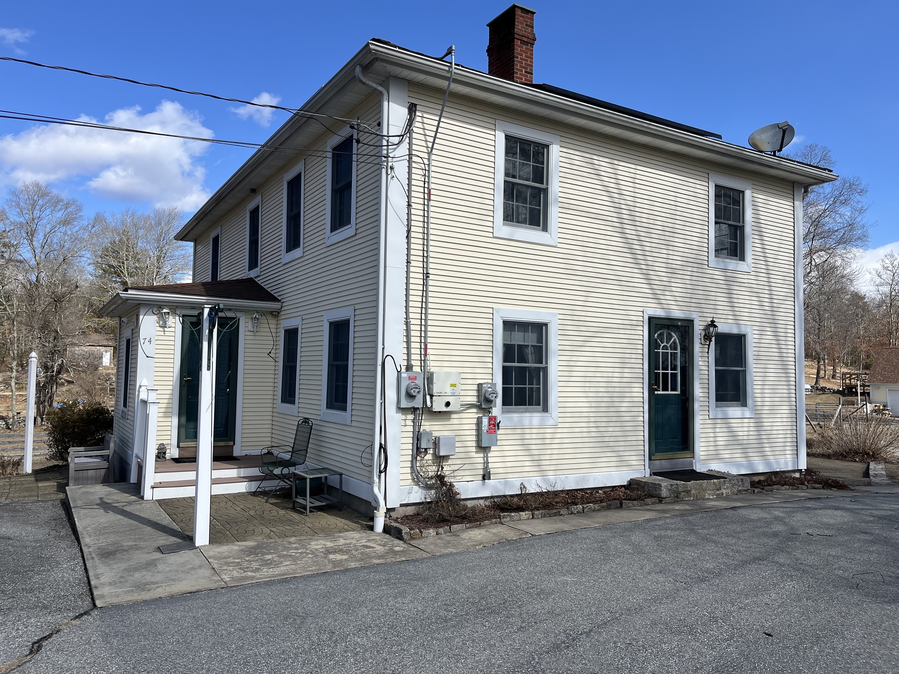 74 Hungry Hill Road Sterling, CT 06377 - Photo 1 of 1 a view of a house with patio