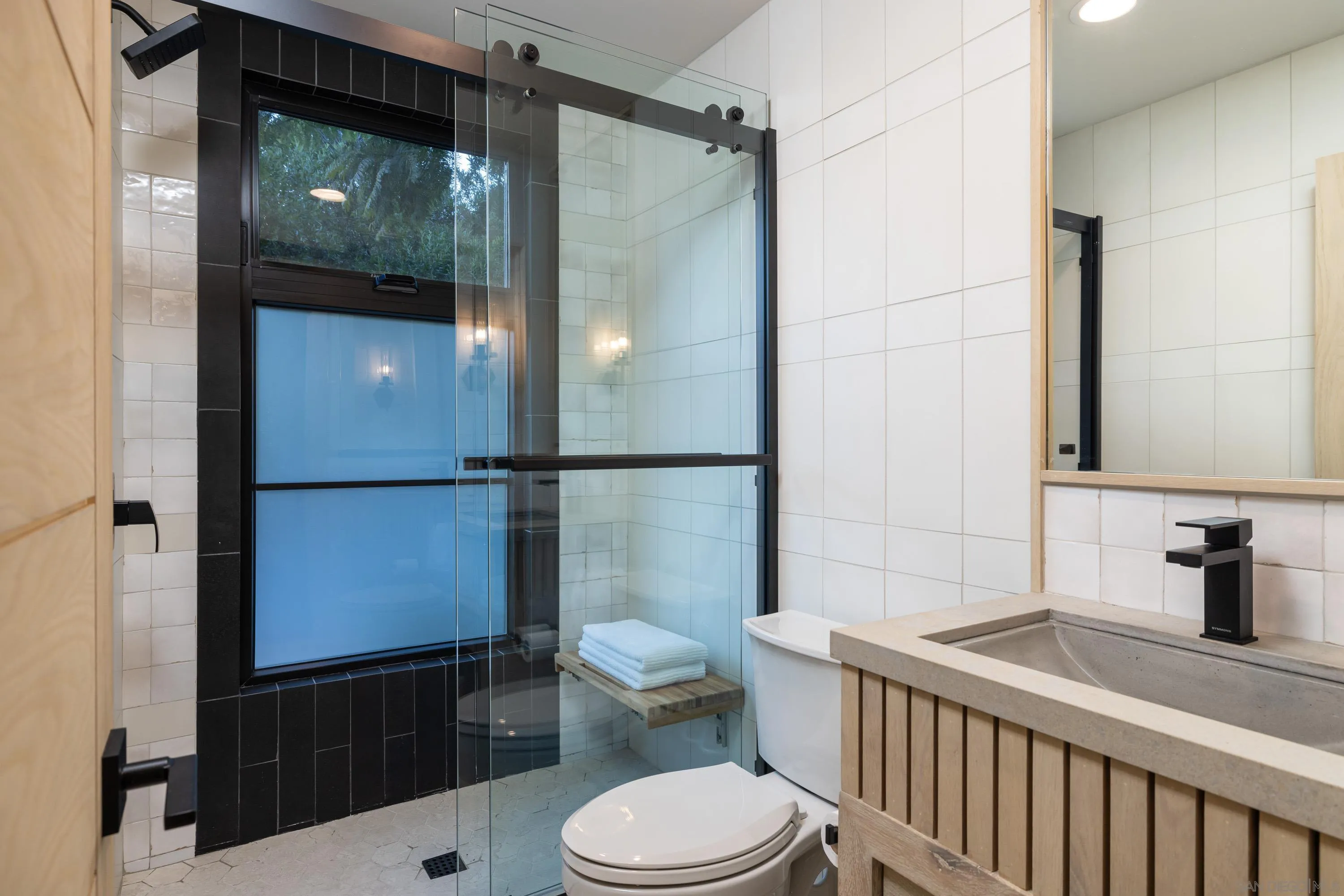 4954 Sun Valley Road Del Mar, CA 92014 - Photo 12 of 31 a bathroom with a sink a toilet and shower