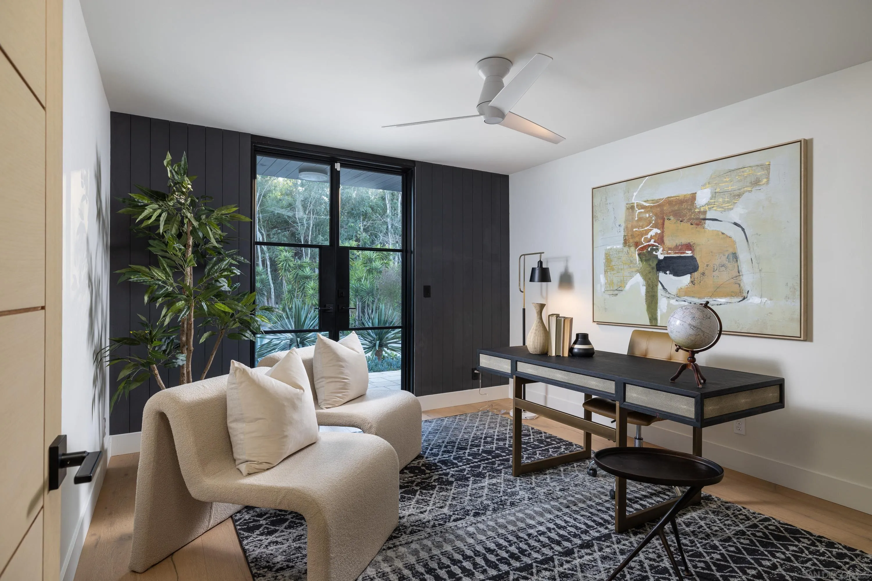 4954 Sun Valley Road Del Mar, CA 92014 - Photo 13 of 31 a living room with furniture and a large window