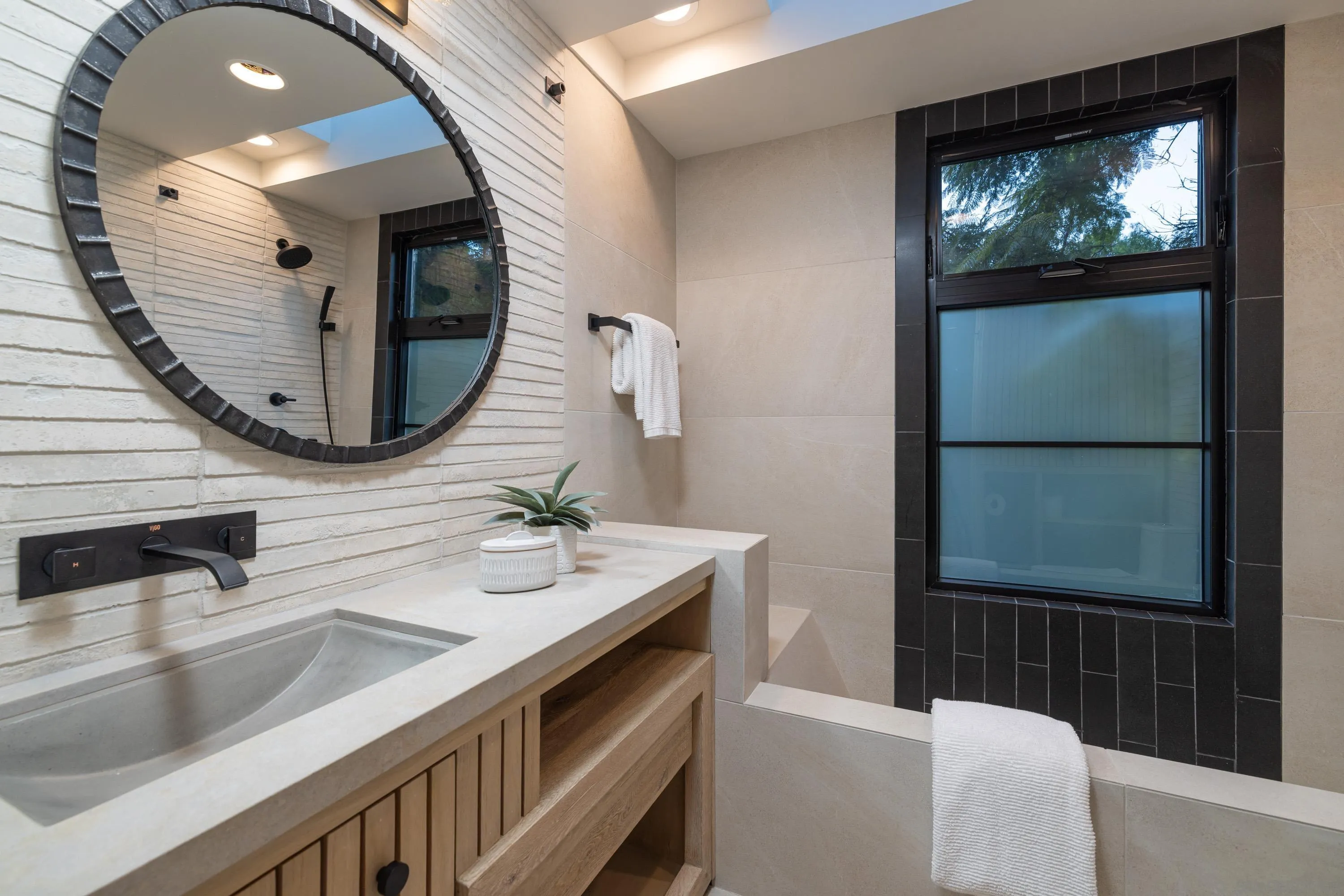 4954 Sun Valley Road Del Mar, CA 92014 - Photo 21 of 31 a bathroom with a sink a mirror and a vanity