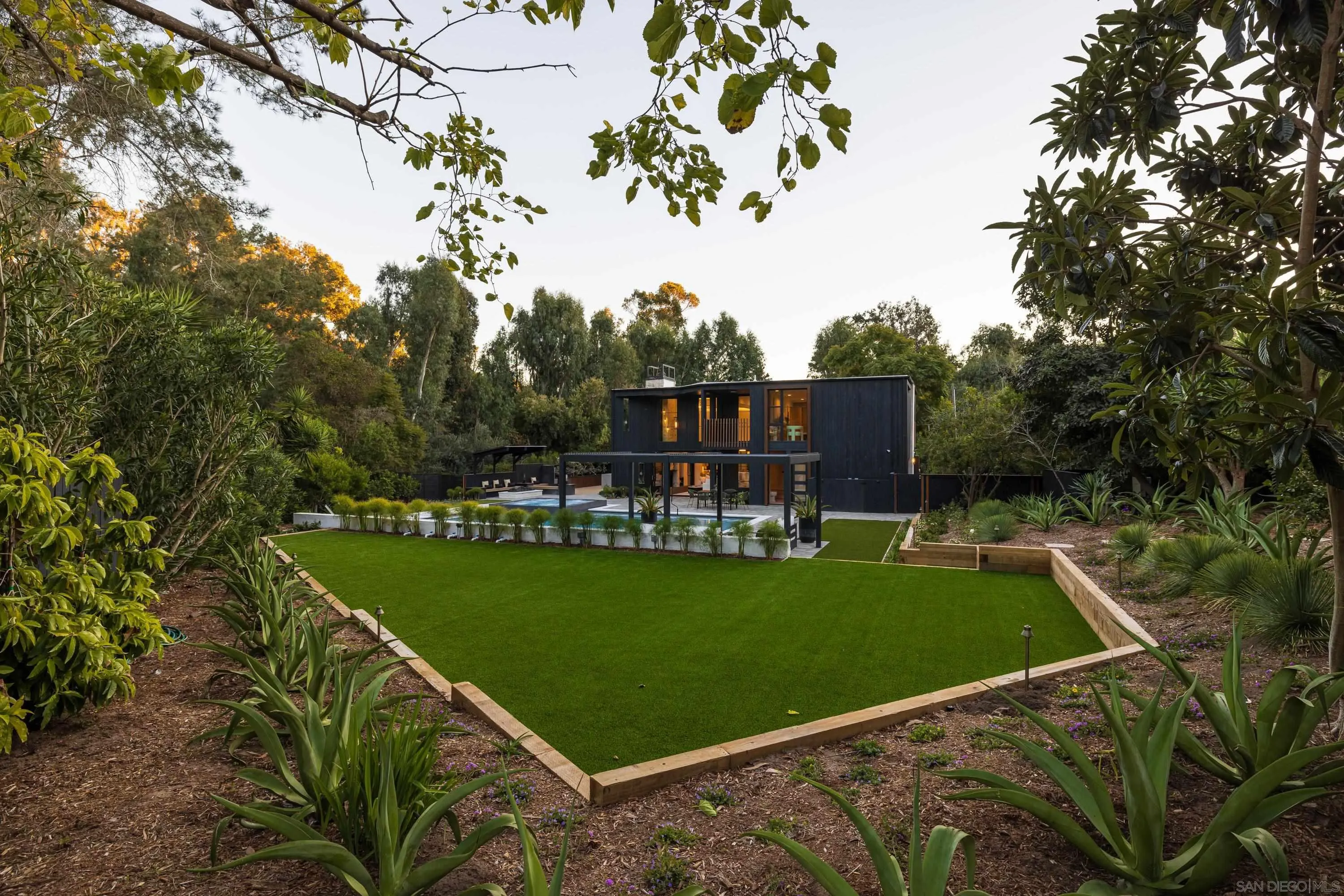 4954 Sun Valley Road Del Mar, CA 92014 - Photo 23 of 31 a view of a swimming pool and a chairs