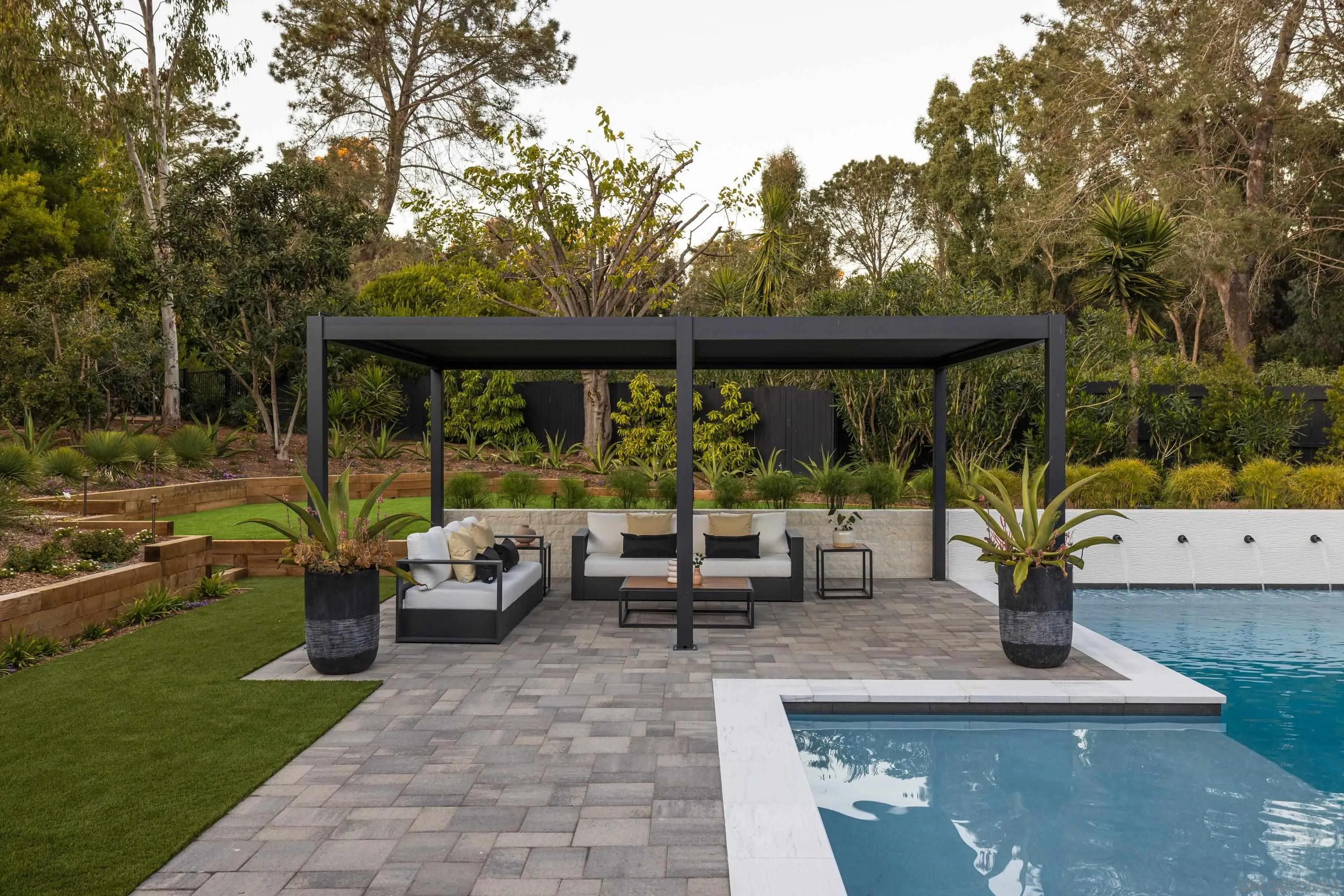 4954 Sun Valley Road Del Mar, CA 92014 - Photo 24 of 31 a view of a patio with couches and potted plants