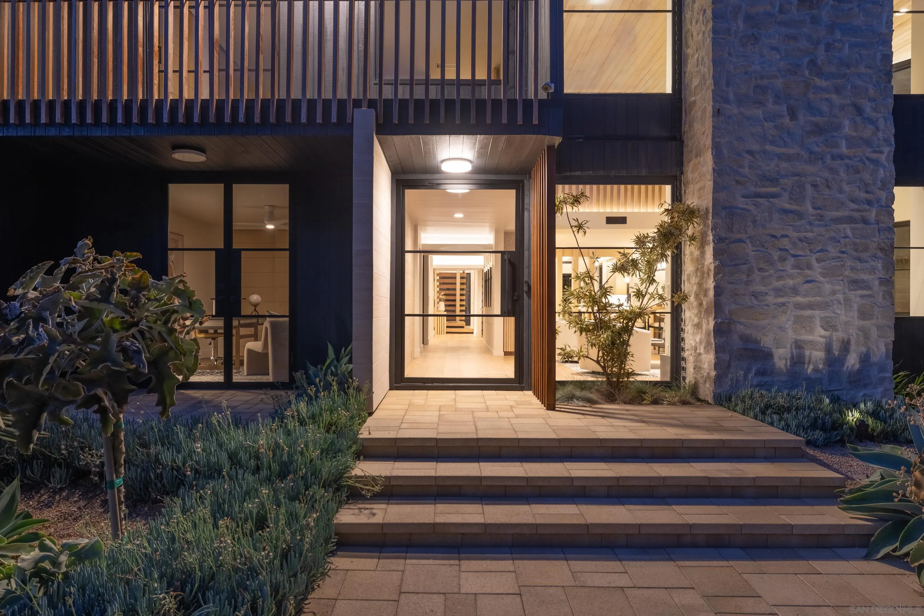 4954 Sun Valley Road Del Mar, CA 92014 - Photo 30 of 31 a front view of a house with a garden