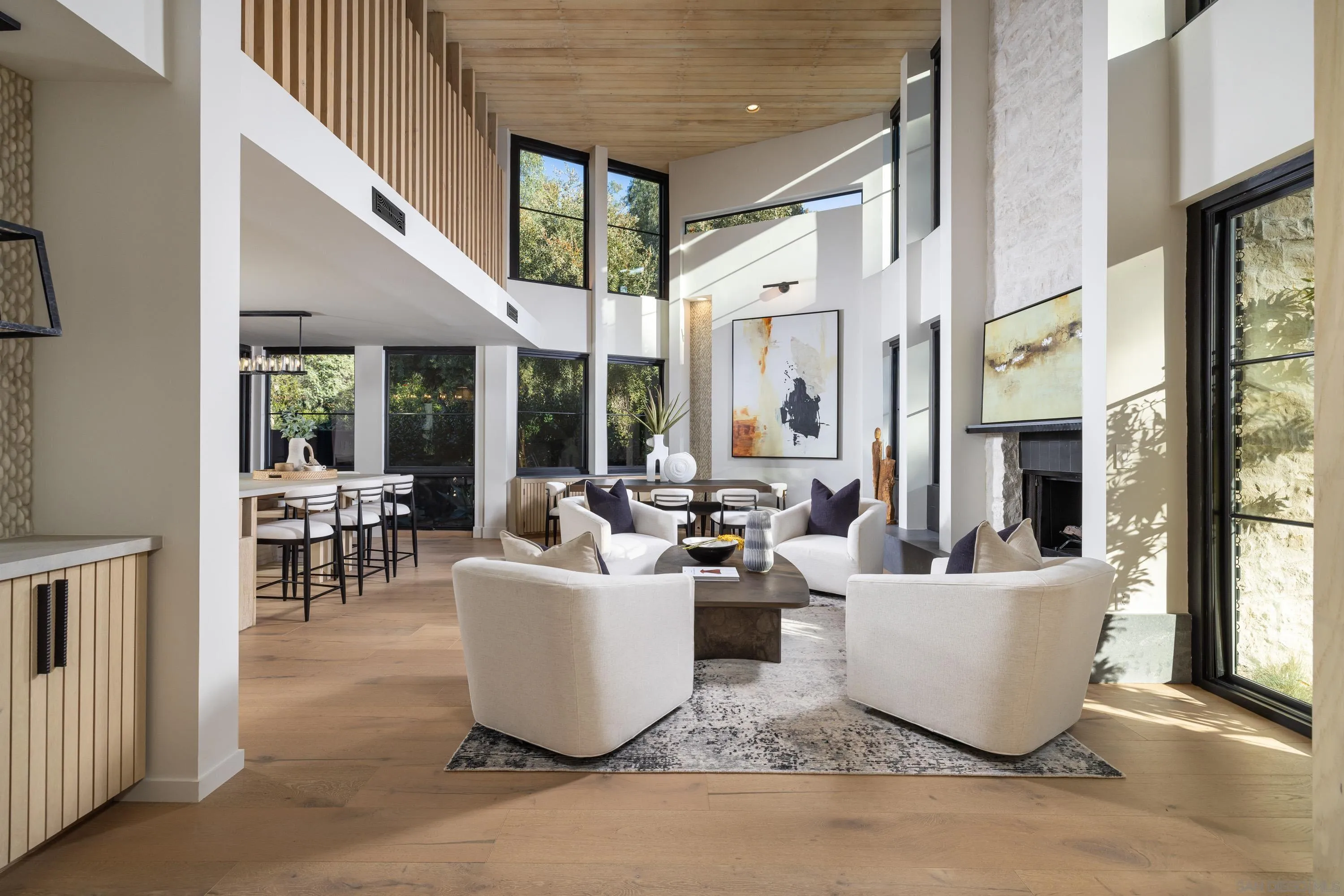 4954 Sun Valley Road Del Mar, CA 92014 - Photo 5 of 31 a living room with fireplace furniture and a large window