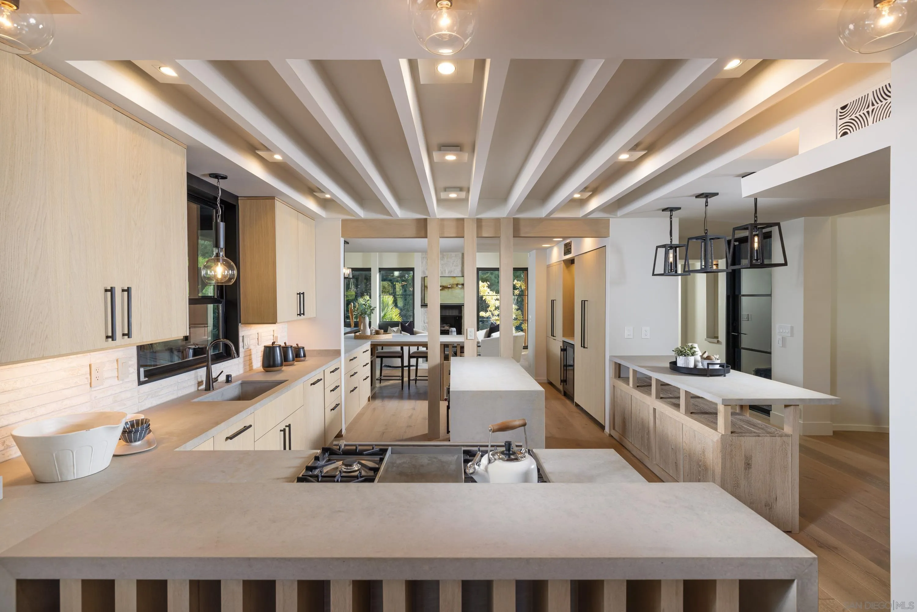 4954 Sun Valley Road Del Mar, CA 92014 - Photo 8 of 31 a living room with furniture and chandelier