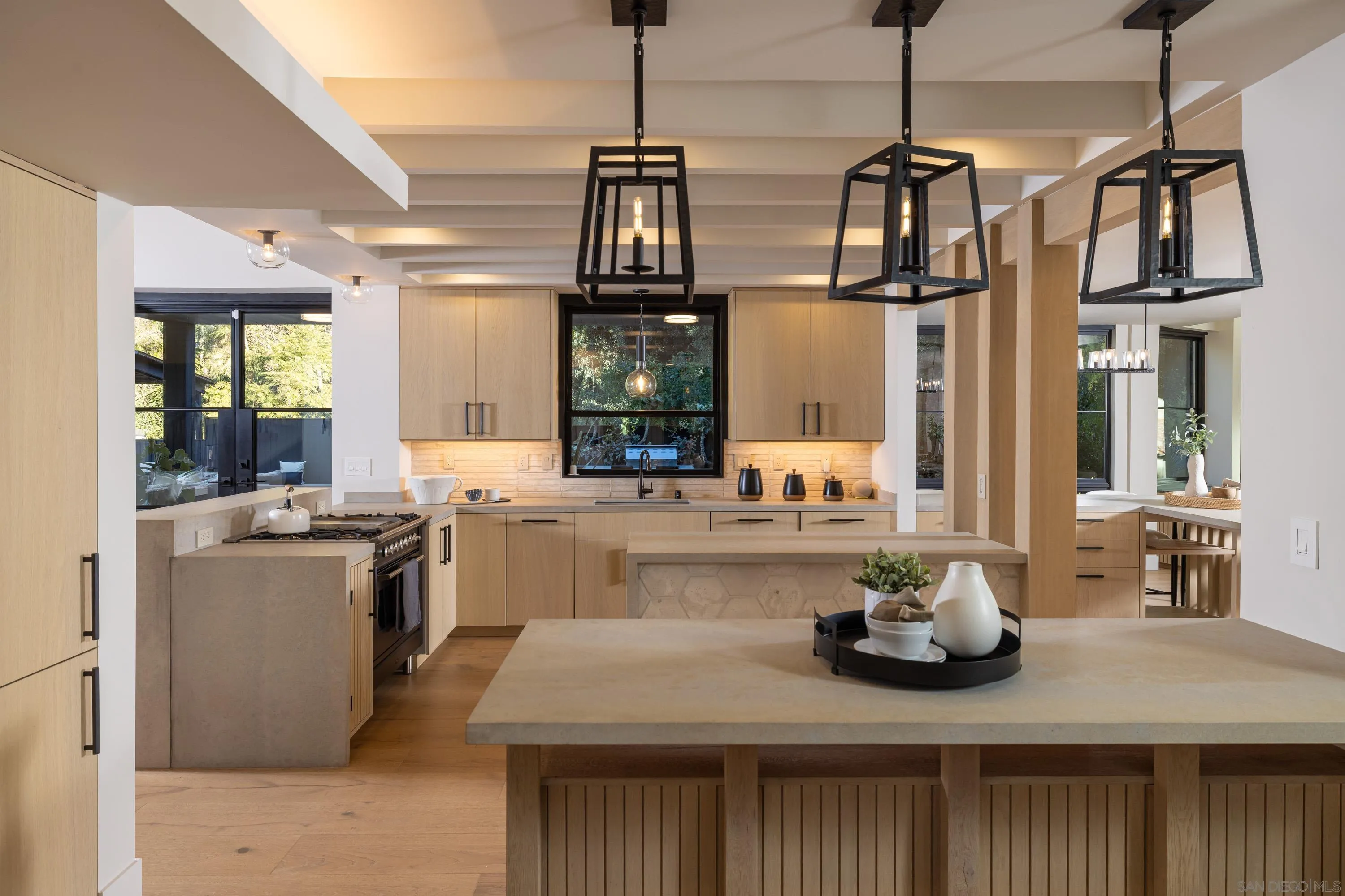 4954 Sun Valley Road Del Mar, CA 92014 - Photo 10 of 31 a kitchen with refrigerator and stove