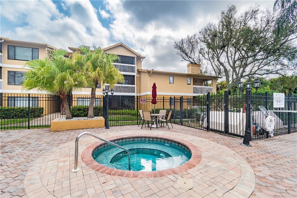 1550 South Belcher Road, Unit 236 Clearwater, FL 33764 - Photo 1 of 1 The 3rd floor unit is to the right of the palm trees