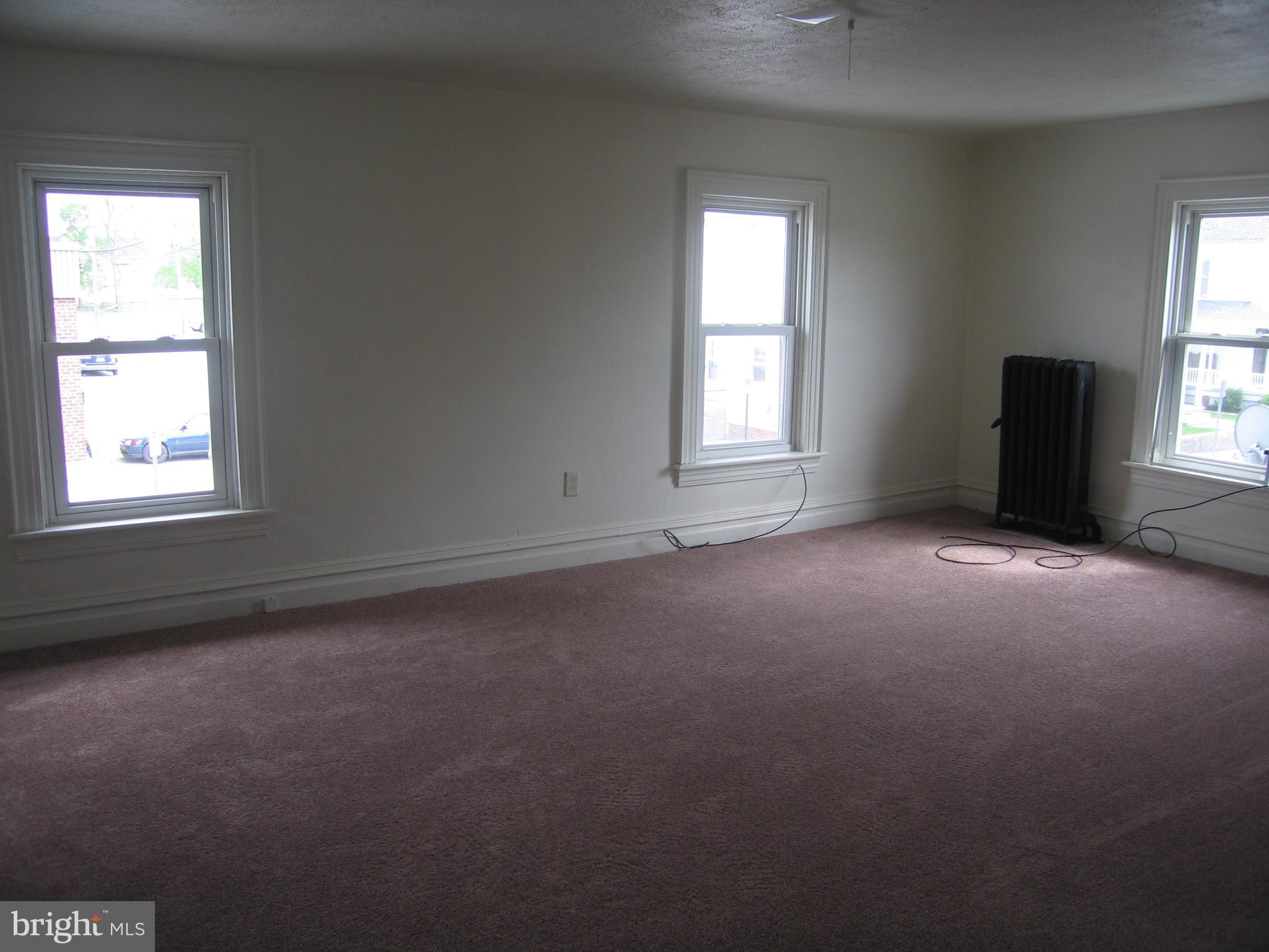 146 Pleasant Street Hanover, PA 17331 - Photo 10 of 13 an empty room with a window