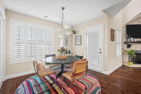 a view of a livingroom with furniture and window