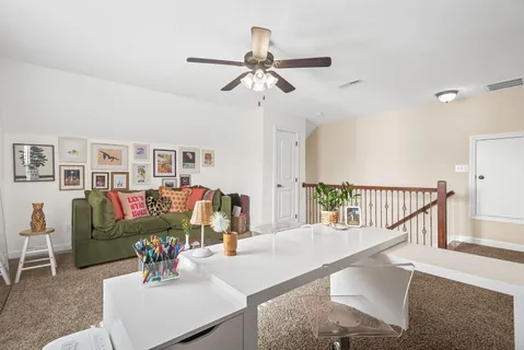 a bathroom with a sink a light fixture and a mirror