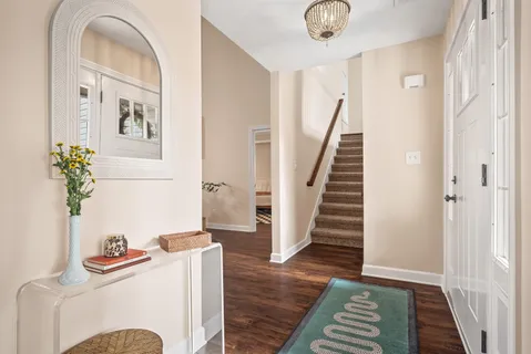 a view of entryway with wooden floor