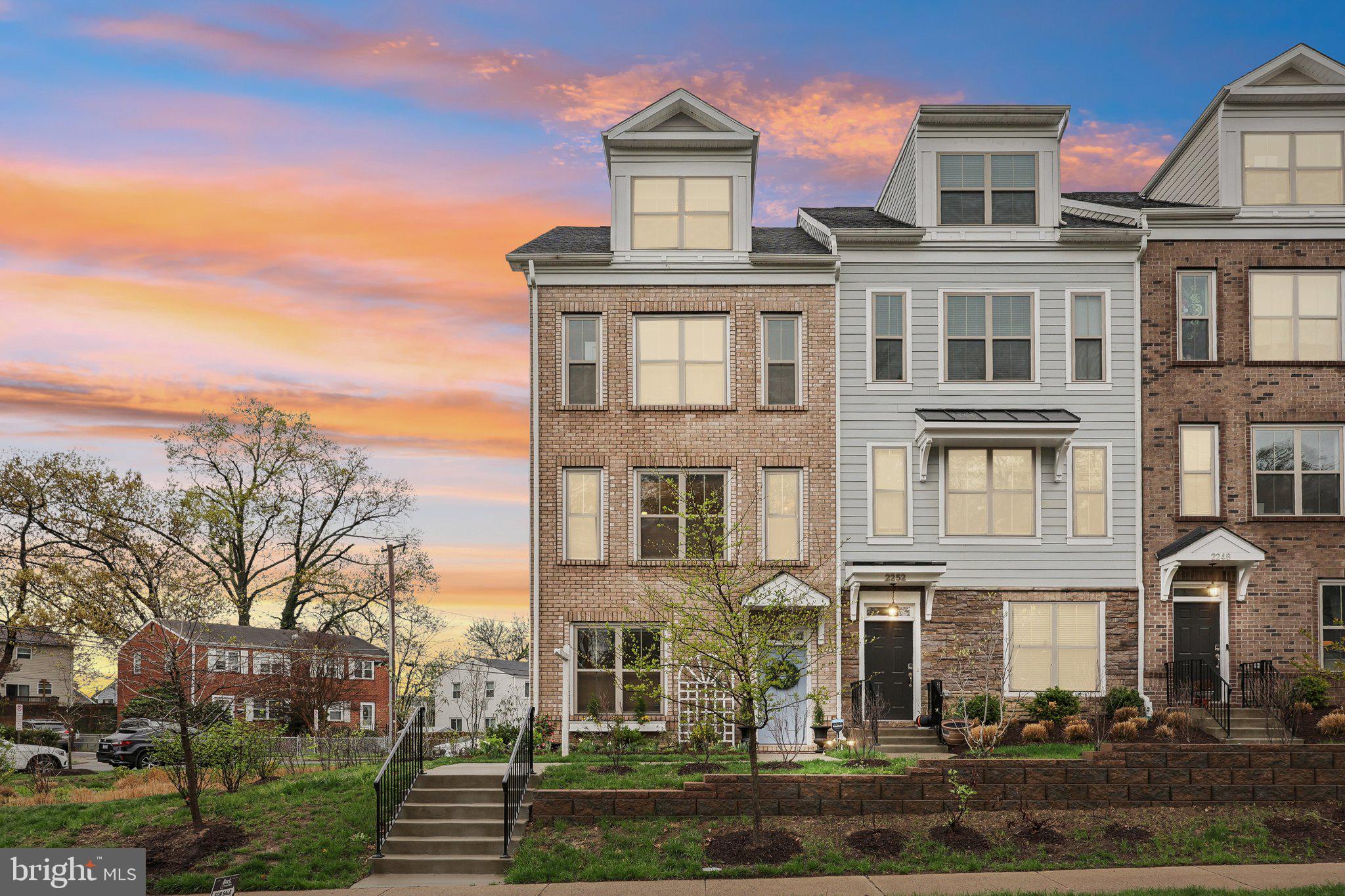 2256 South Glebe Road Arlington, VA 22206 - Photo 1 of 53 a front view of a residential apartment building with a yard