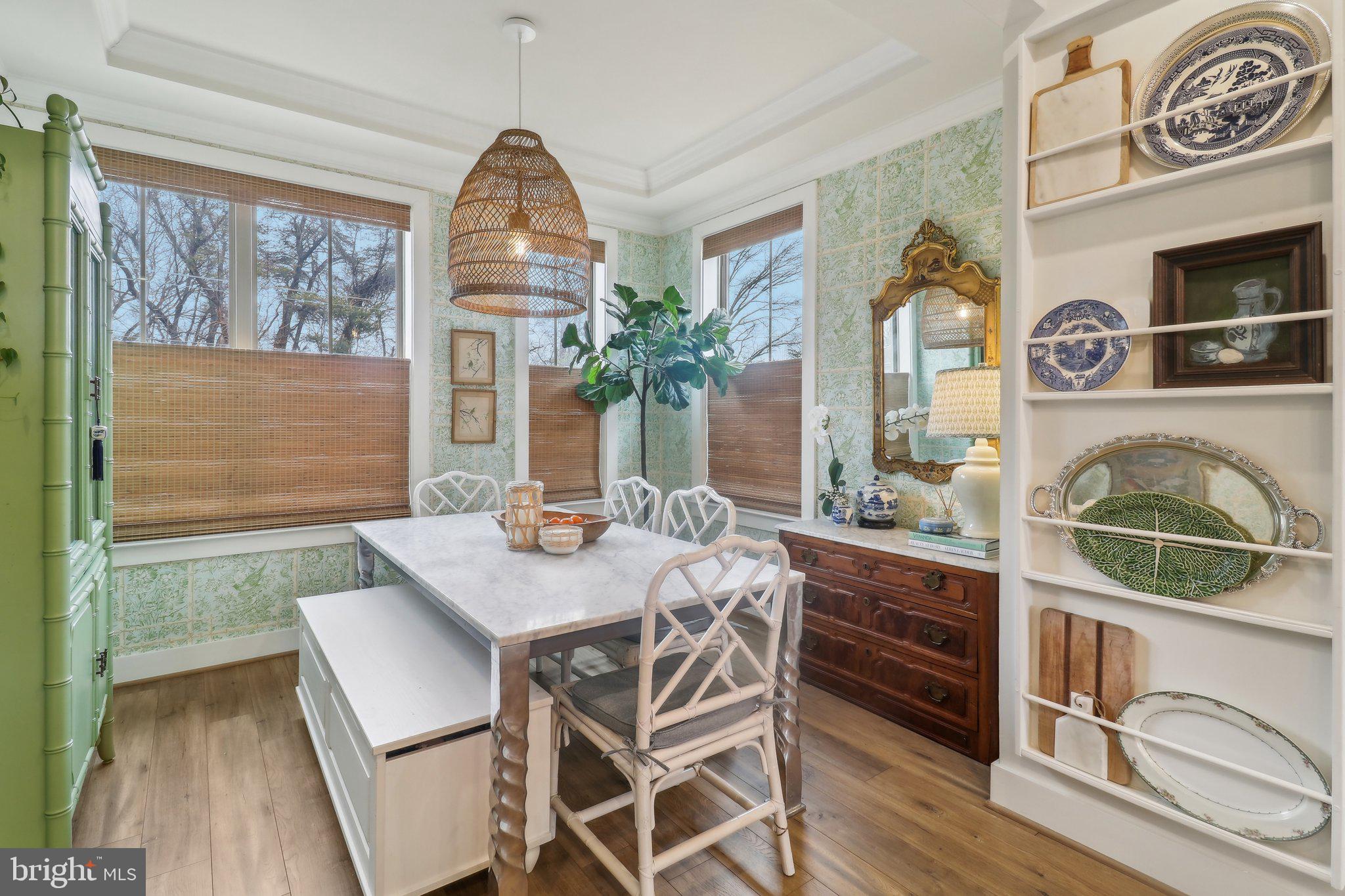 2256 South Glebe Road Arlington, VA 22206 - Photo 16 of 53 a view of a dining room with furniture window and wooden floor
