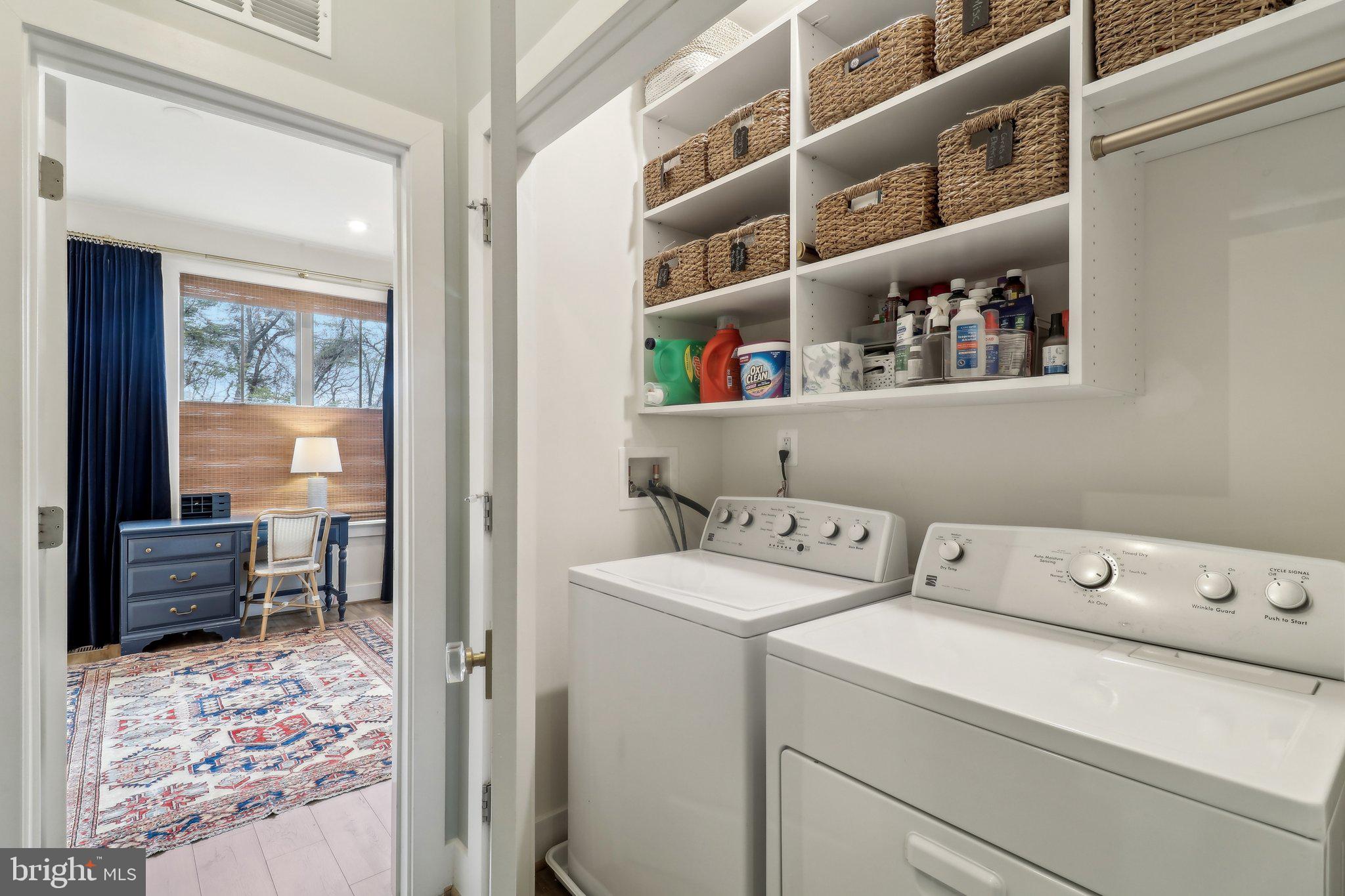2256 South Glebe Road Arlington, VA 22206 - Photo 35 of 53 a view of storage and utility room with washer and dryer