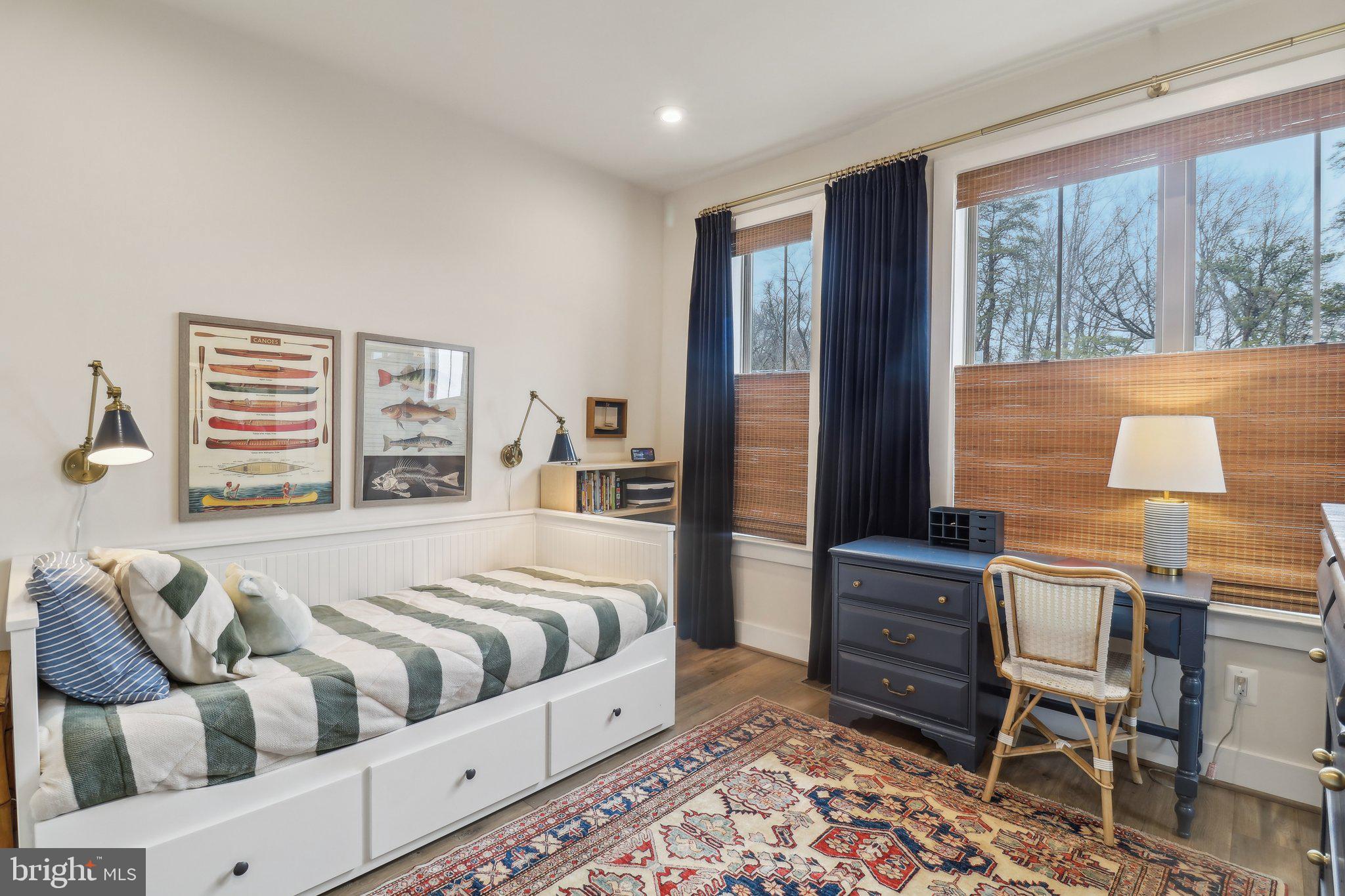 2256 South Glebe Road Arlington, VA 22206 - Photo 36 of 53 a bedroom with a large bed and a window