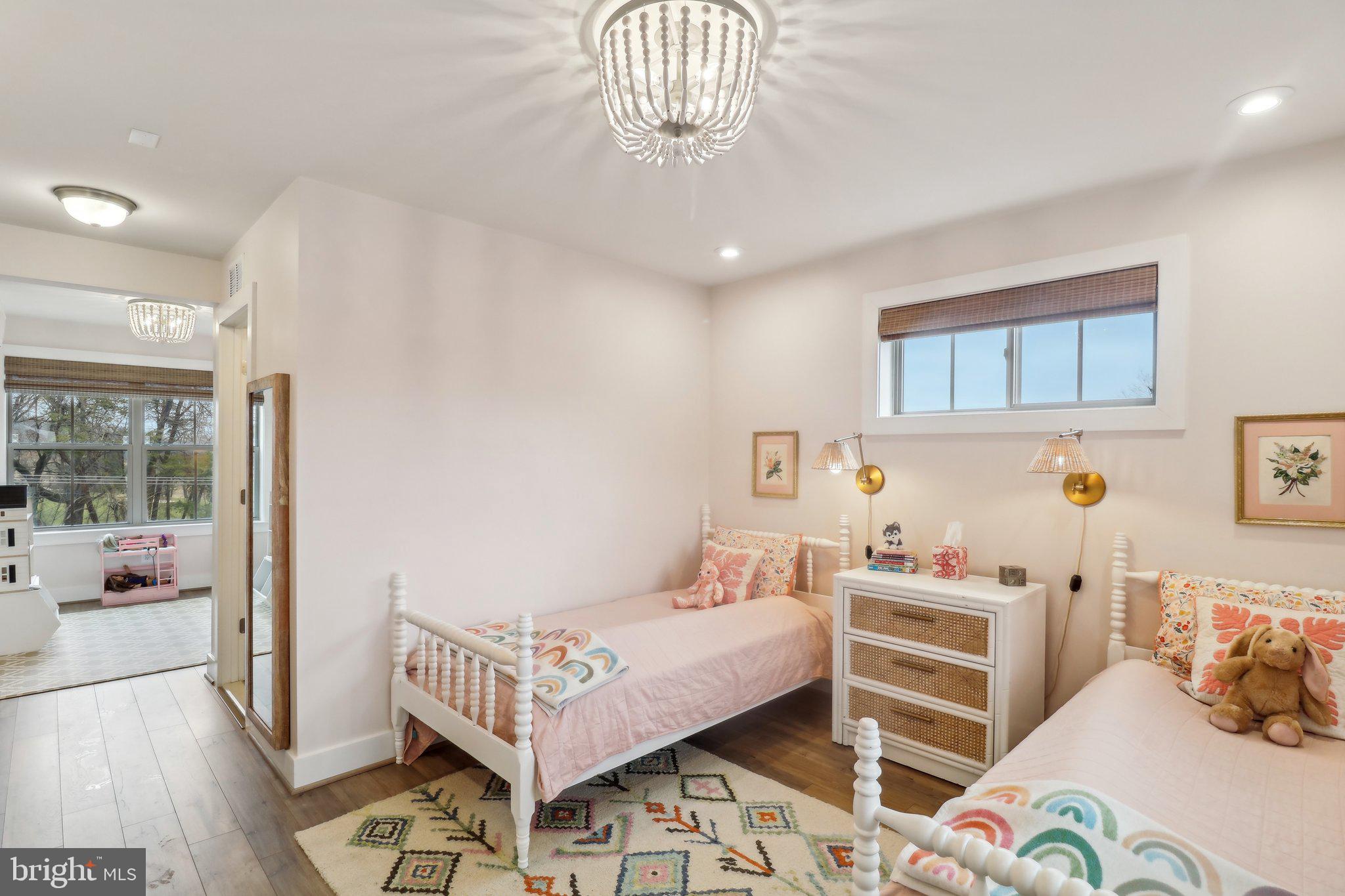 2256 South Glebe Road Arlington, VA 22206 - Photo 39 of 53 a bedroom with a bed and a window