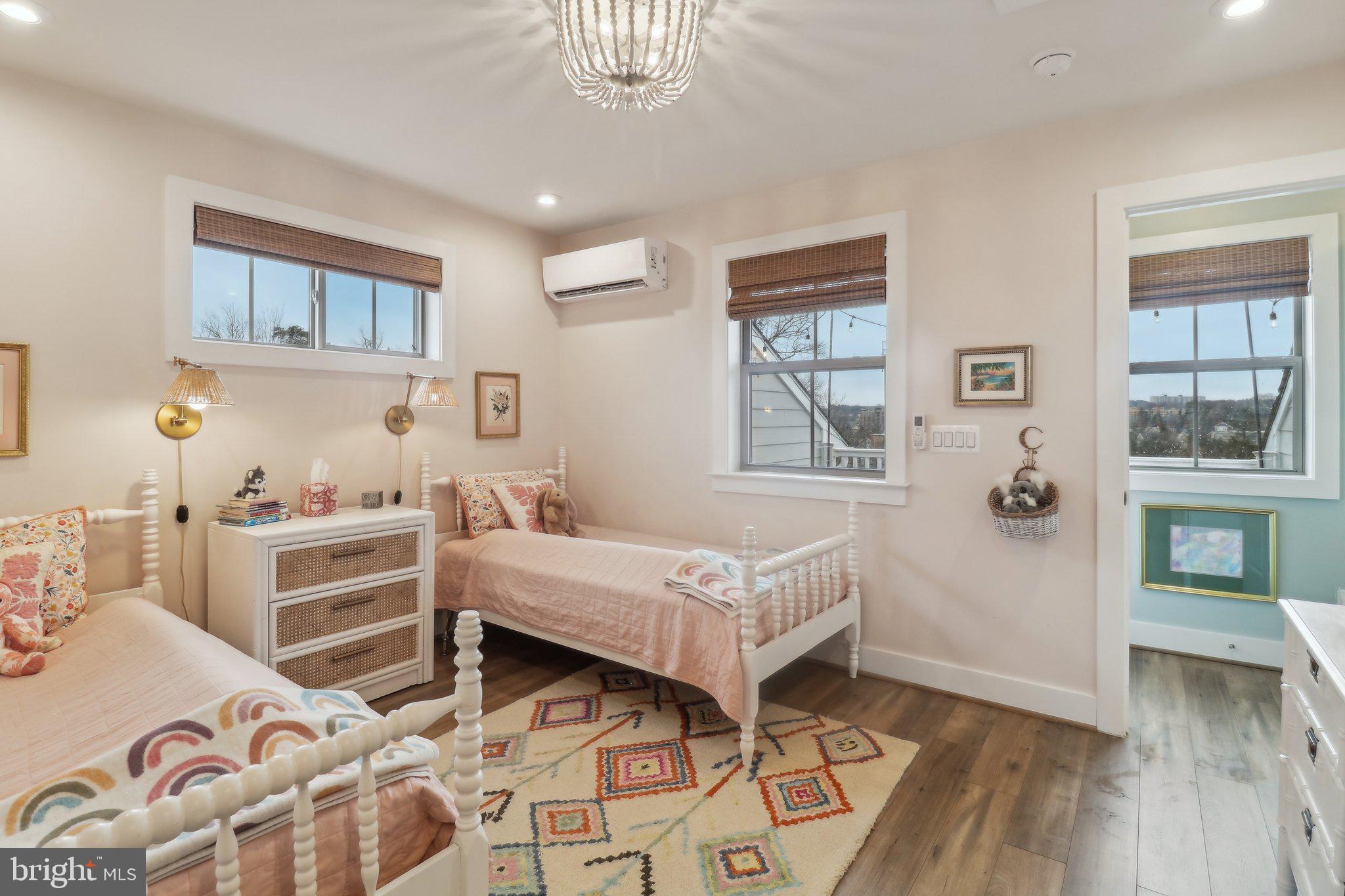2256 South Glebe Road Arlington, VA 22206 - Photo 41 of 53 a bedroom with a bed and a window